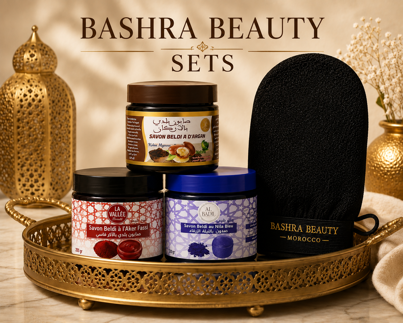 Bashra Beauty Collection featuring Moroccan black soap, Nila Sabounia, Aker Fassi soap, and a premium kessa exfoliating glove for an authentic hammam experience.