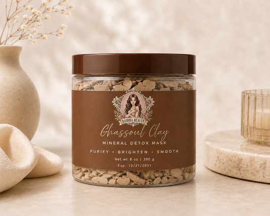 Bashra Beauty Ghassoul Clay Mineral Detox Mask jar with authentic Moroccan rhassoul clay in elegant neutral spa-inspired setting.