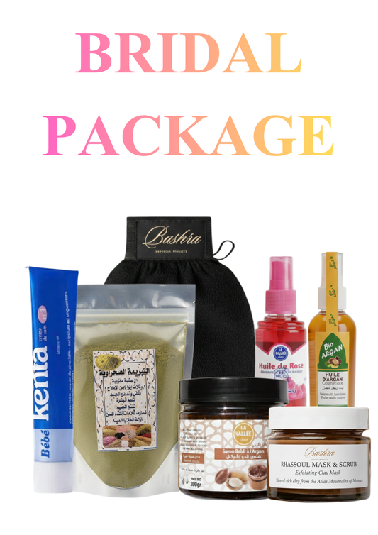 Bashra Beauty Bridal Package featuring Kenz Bébé cream, Bashra kessa mitt, Moroccan clay powder, La Vallee Savon Beldi argan soap, Huile de Rose spray, Bio Argan oil, and Bashra Rhassoul Mask & Scrub on a white background