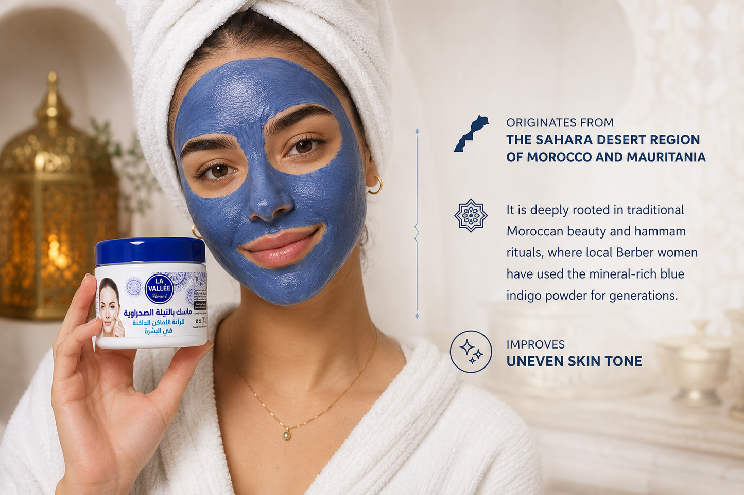 Young woman wearing a blue Sahara Nila face mask while holding La Vallée Blue Nila Mask. Traditional Moroccan skincare inspired by Berber beauty rituals to help improve uneven skin tone.