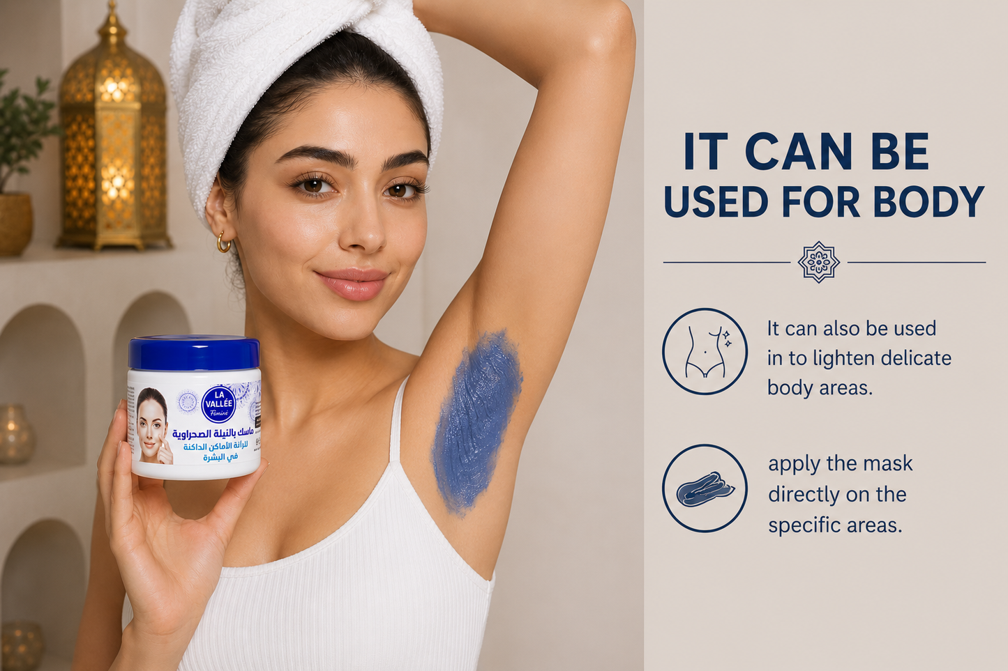 Woman applying La Vallée Blue Nila Mask to her underarm while holding the product. Demonstrates how the Moroccan blue indigo mask can be used on delicate body areas to promote a more even-looking skin tone.